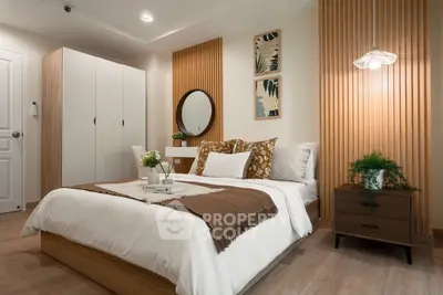 Modern bedroom with stylish decor, featuring a cozy bed, elegant lighting, and wooden accents for a warm ambiance.