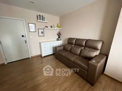 Cozy living room with leather sofa and modern decor