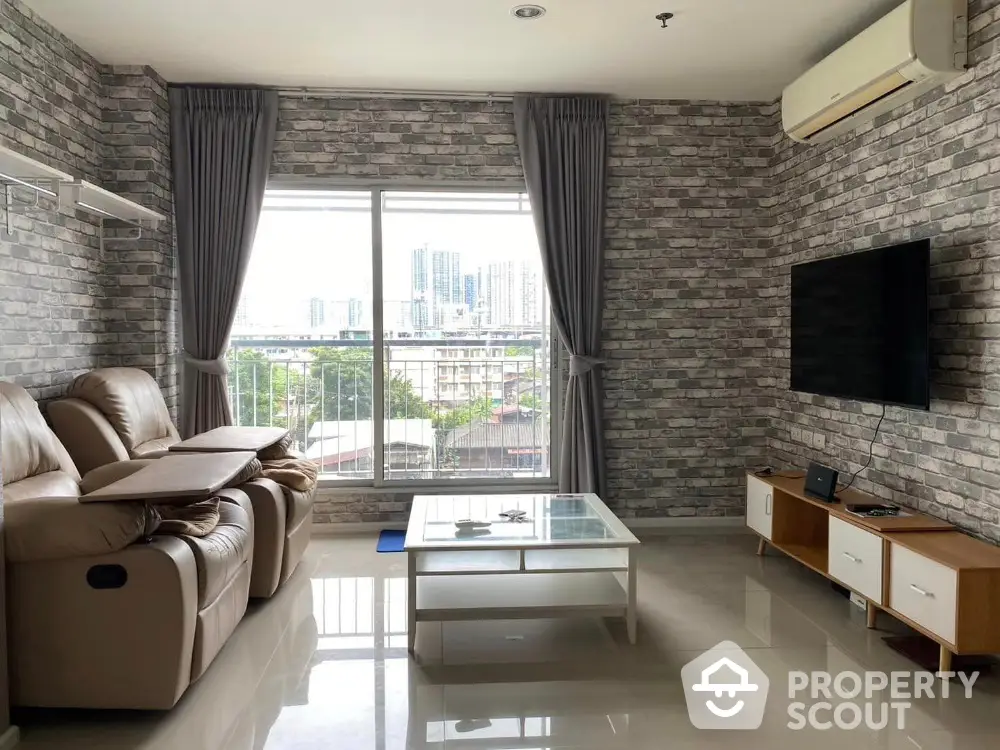 Modern living room with city view, featuring stylish brick walls and comfortable seating.