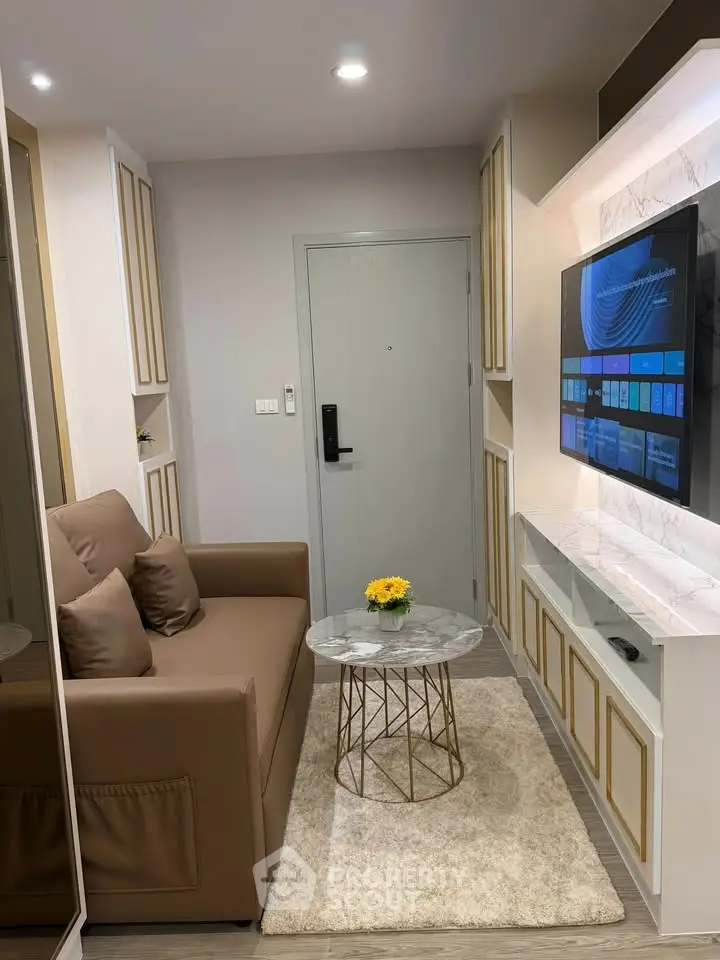 Cozy living room with modern decor and wall-mounted TV