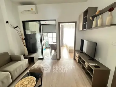 Modern living room with sleek furniture and natural light