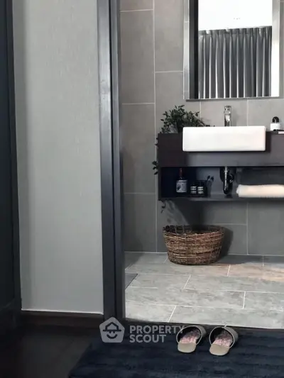 Modern bathroom with sleek sink and stylish decor