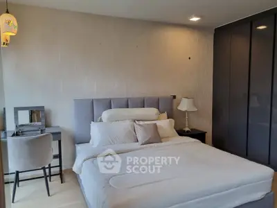 Modern bedroom with stylish decor and cozy ambiance