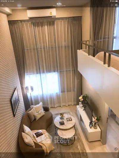 Stylish loft apartment with modern living room and mezzanine bedroom