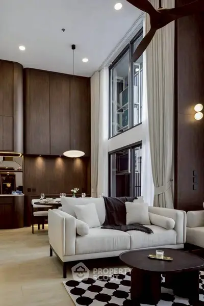 Luxurious modern living room with high ceilings and elegant decor