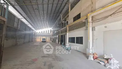 Spacious industrial warehouse with high ceilings and ample storage space