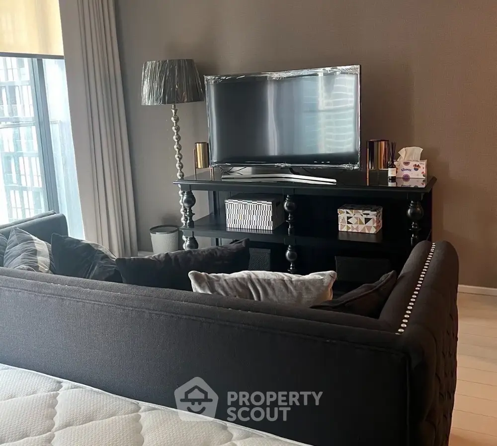 Stylish living room with modern TV setup and elegant decor