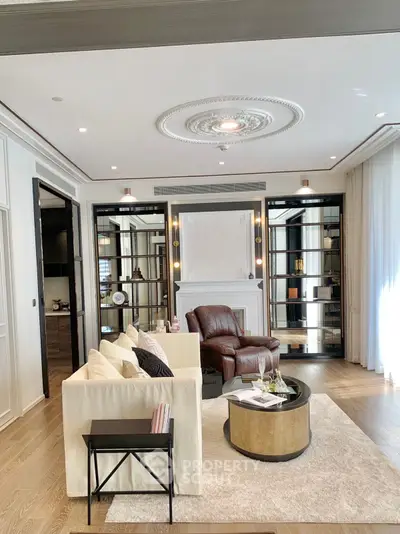 Luxurious living room with elegant decor and plush seating