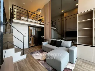 Modern loft apartment with stylish living room and mezzanine bedroom