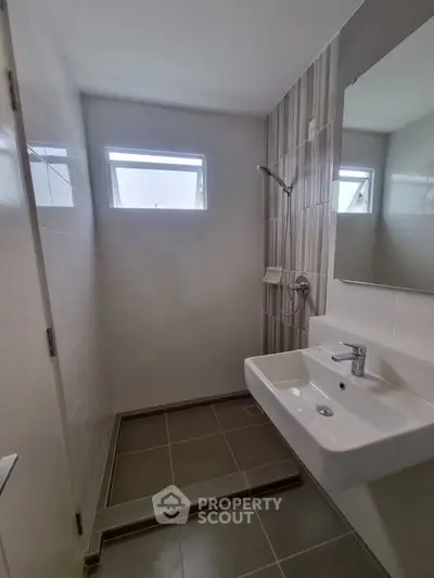 Modern bathroom with sleek design and natural light