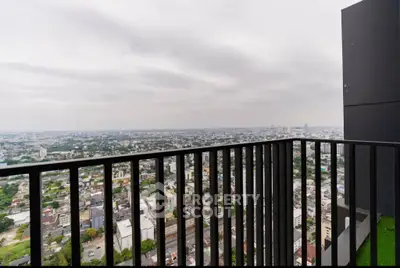 Stunning cityscape view from a high-rise balcony, perfect for urban living enthusiasts.