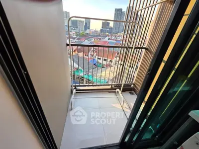 Charming urban balcony with city view, perfect for relaxation and enjoying the skyline.