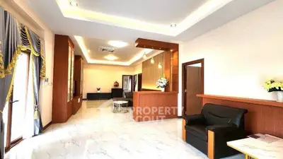 Luxurious open living room with elegant decor and marble flooring
