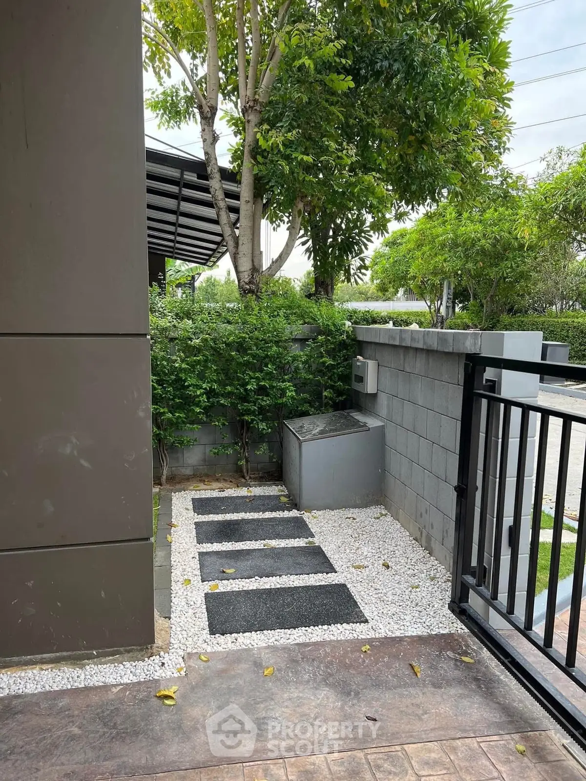 Charming garden corner with modern landscaping and privacy wall