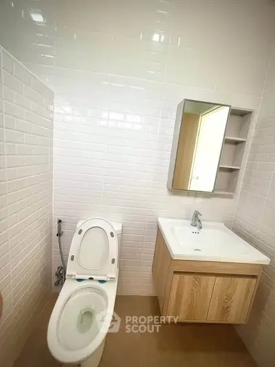Modern bathroom with sleek fixtures and minimalist design.