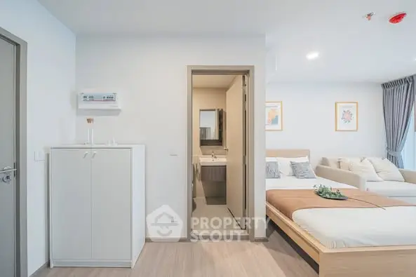 Modern studio apartment with open layout and cozy furnishings