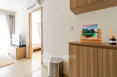 Modern apartment interior with wooden furniture and natural light, showcasing a cozy and inviting living space.