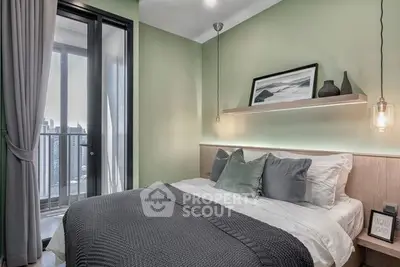 Modern bedroom with balcony access and stylish decor in urban apartment.