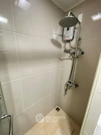 Modern bathroom shower with sleek tiles and dual shower heads