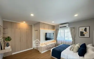 Modern bedroom with stylish decor and cozy ambiance