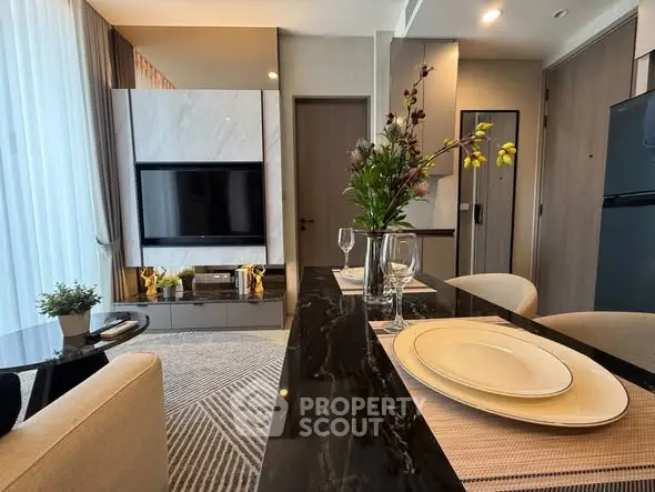 Modern living room with elegant dining area and stylish decor
