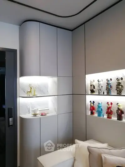 Modern living room with stylish display shelves and contemporary decor