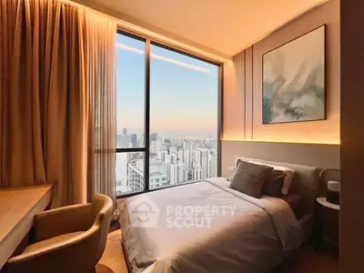 Luxurious bedroom with stunning city view and elegant decor