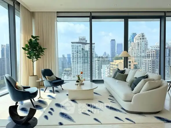 Luxurious living room with panoramic city views and modern furnishings in a high-rise apartment.