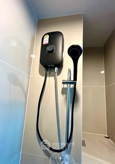 Modern bathroom with sleek shower unit and elegant tiling