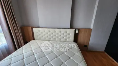 Modern bedroom with stylish headboard and natural light