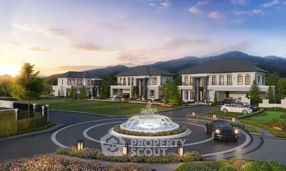 Luxurious estate with grand entrance, fountain, and mountain views at sunset.