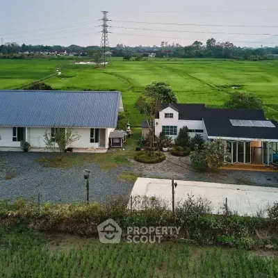 Charming countryside property with modern farmhouse and lush green fields