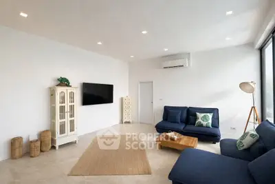 Spacious modern living room with stylish furniture and natural light