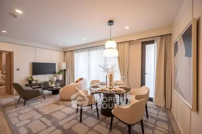 Elegant living room with modern dining area and stylish decor