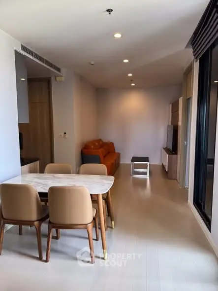 Modern living room with stylish furniture and open layout in a contemporary apartment.