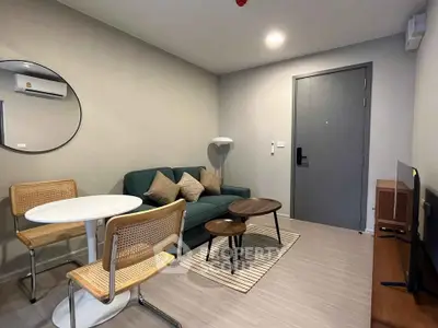 Modern living room with stylish furniture and neutral tones, perfect for cozy relaxation.