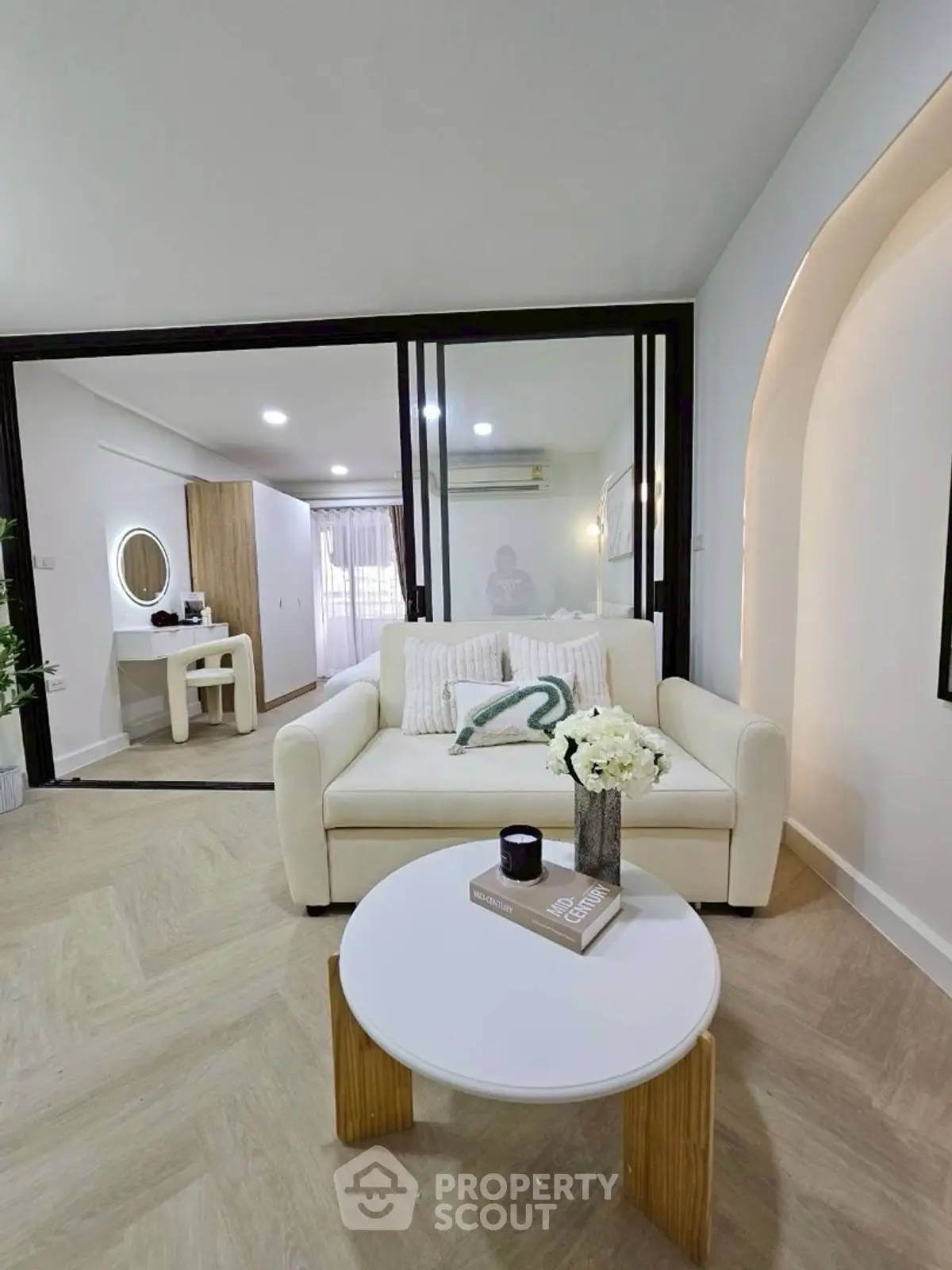 Modern living room with cozy sofa and stylish decor