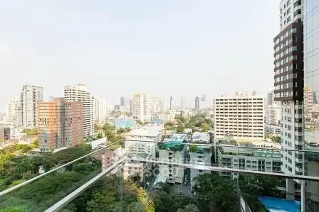 Stunning cityscape view from a high-rise balcony, showcasing urban living at its finest.