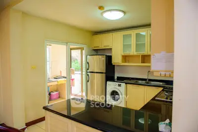 Spacious kitchen with modern appliances and open layout