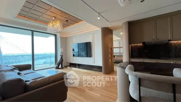 Luxurious living room with modern decor and stunning balcony view