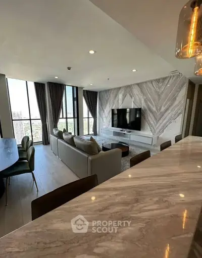 Luxurious modern living room with stunning city view and elegant decor