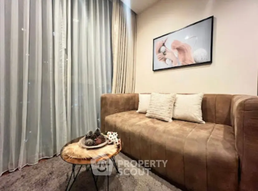 Cozy living room with plush brown sofa and stylish decor, perfect for relaxation.