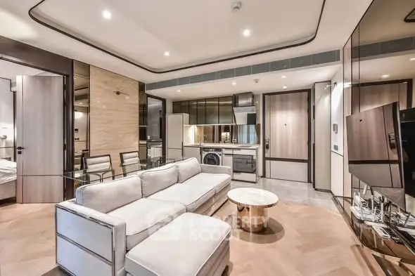 Luxurious modern living room with open kitchen and elegant decor