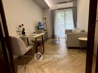 Modern living room with stylish furniture and natural light