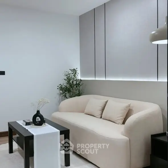 Modern living room with sleek sofa and stylish decor