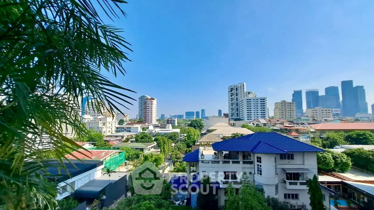 Stunning cityscape view with modern skyscrapers and lush greenery, perfect for urban living enthusiasts.