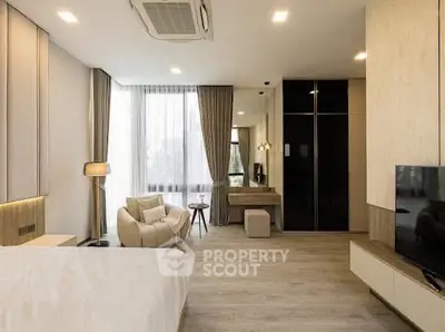 Luxurious modern bedroom with elegant decor and large windows