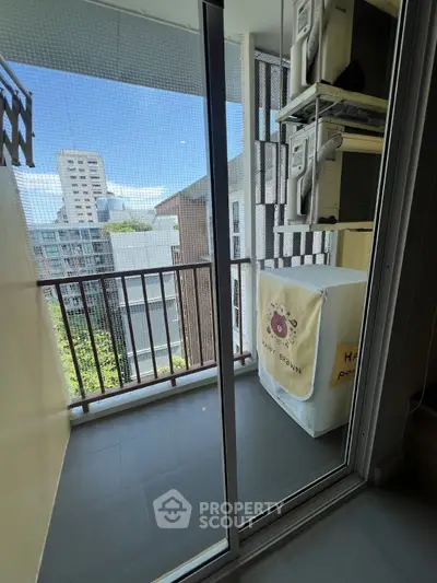 Charming balcony with city view, perfect for relaxation in urban living.