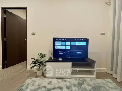 Modern living room with sleek TV setup and stylish decor