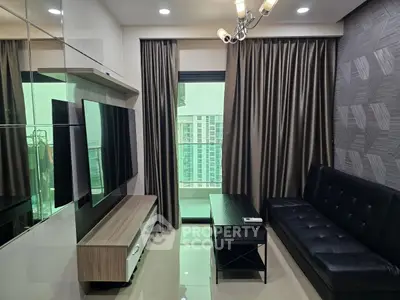 Modern living room with sleek furniture and city view balcony.